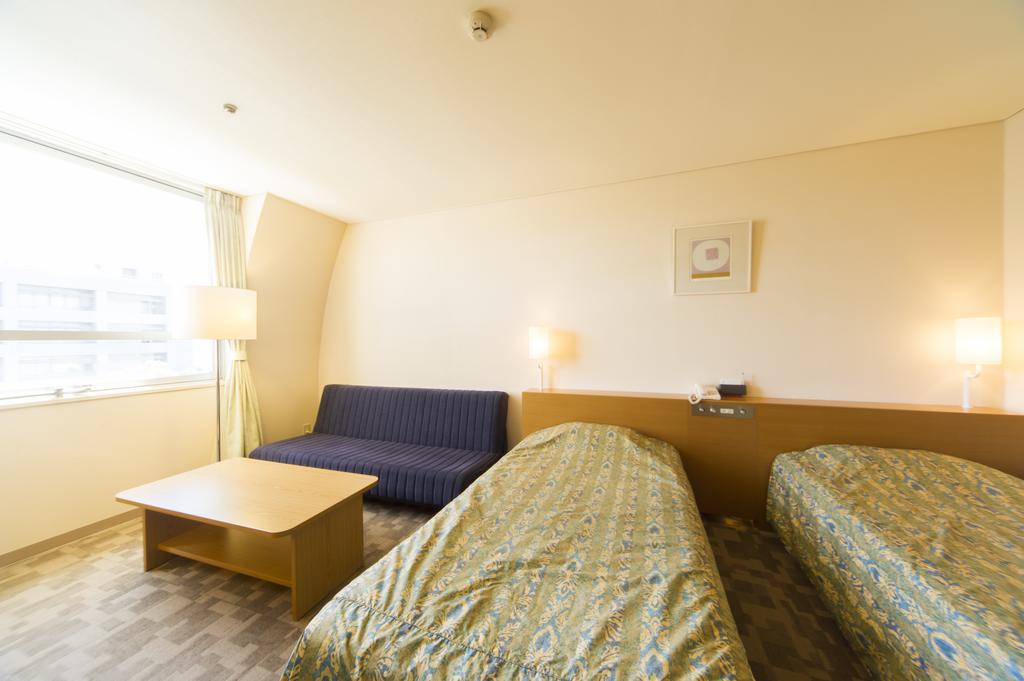 Hotel Hiroshima Sunplaza Quarto foto
